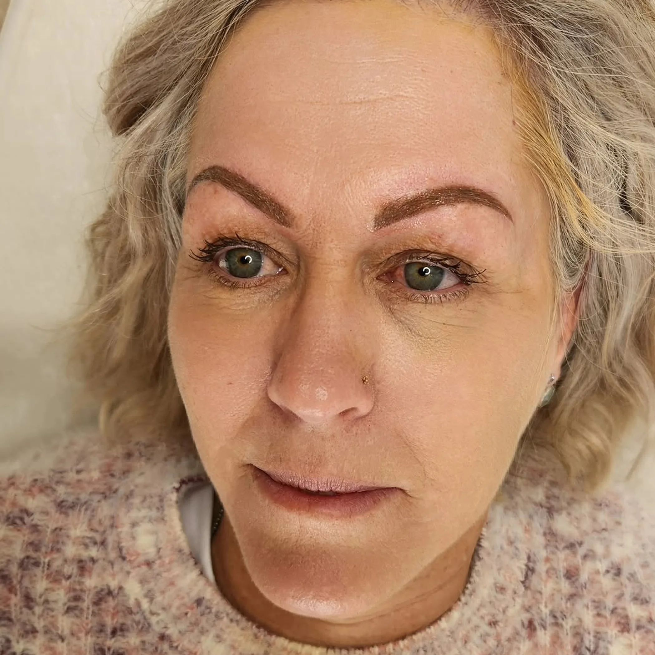 close-up of cosmetic eyebrow tattooing