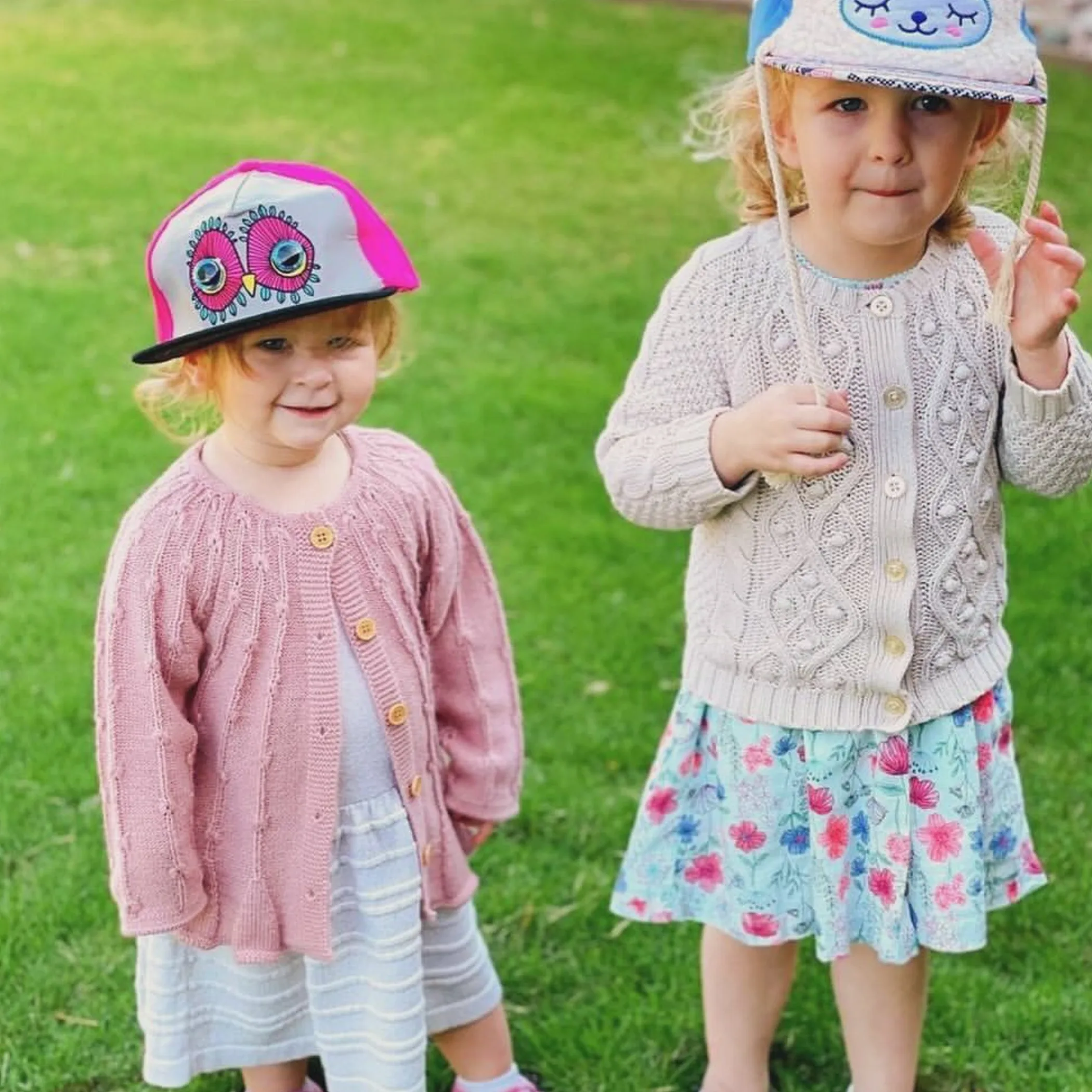 children wearing hats outdoors