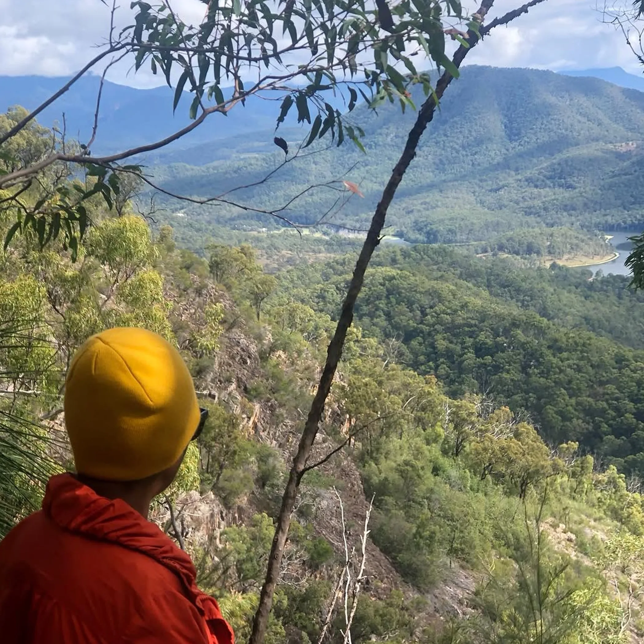 hiker wearing wide brim hat and sunscreen